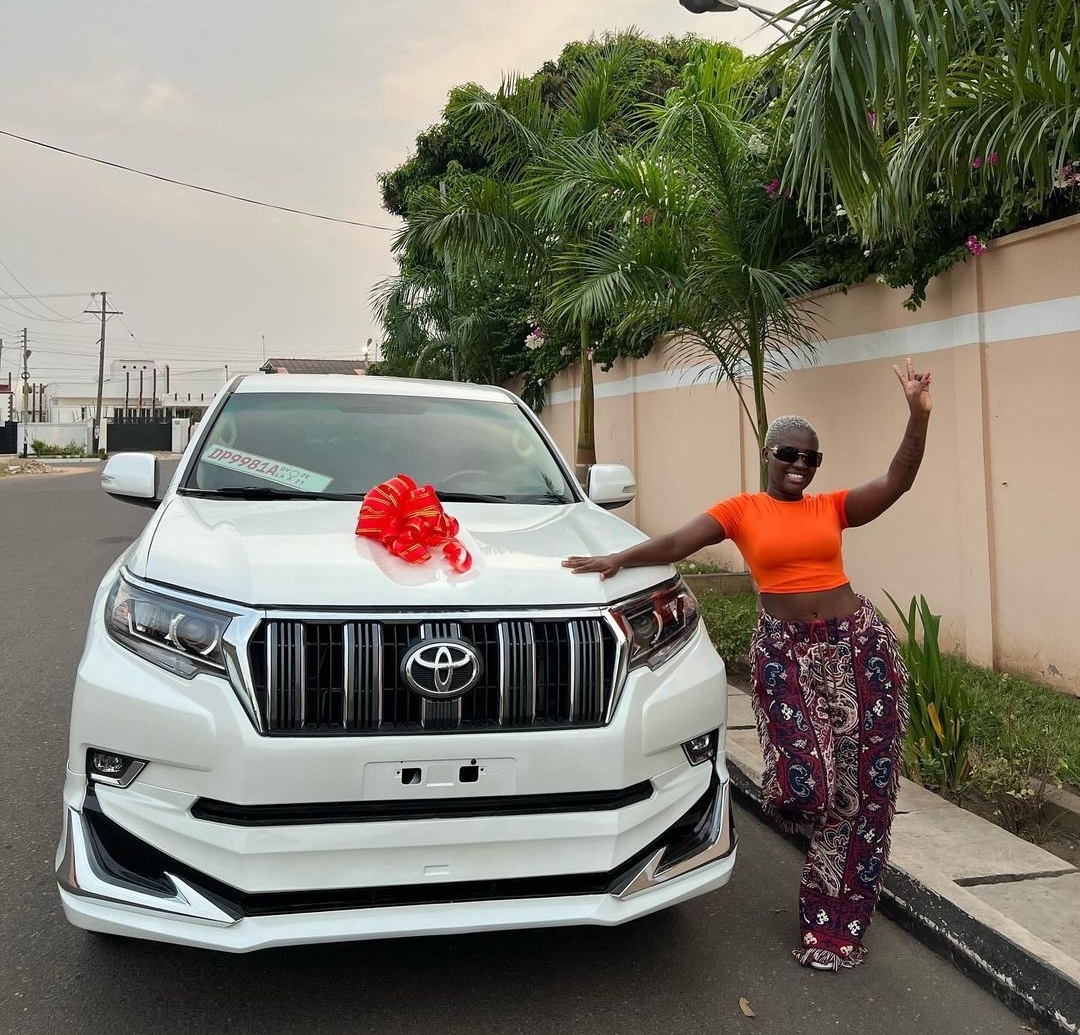 Fella Makafui bought a new V8 car to start 2024 (Photos)